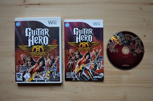 Wii guitar hero - -,